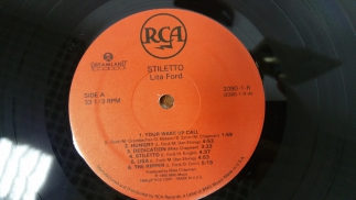 Lita Ford	1990	Stiletto	RCA	US	2090-1-R	EX		Insert	3200	Pop-Rock